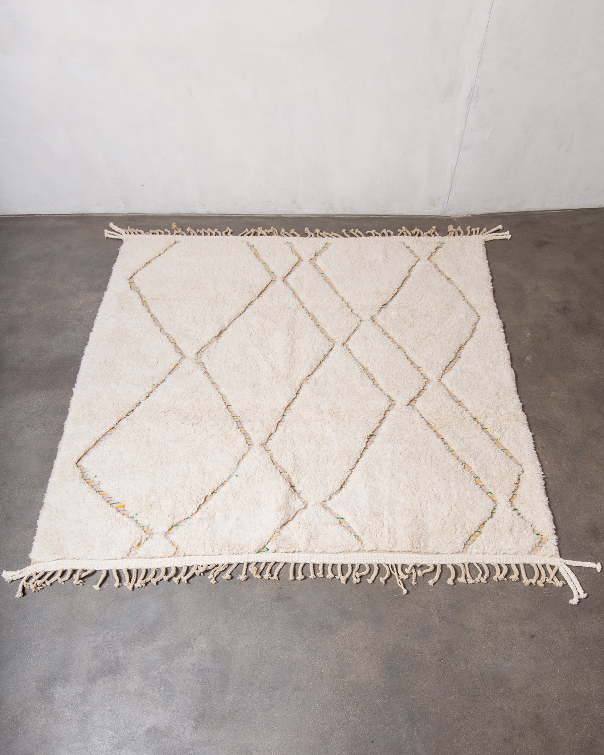 Modern, designer, handcrafted Berber rug from Morocco. Beniourain carpet with minimalist design, natural wool pile and a fluffy texture.